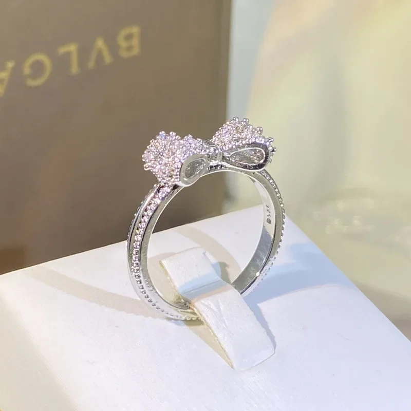 Fancy Bow Ring with Dazzling C - مراجعة Tie Clip Silver وسعره