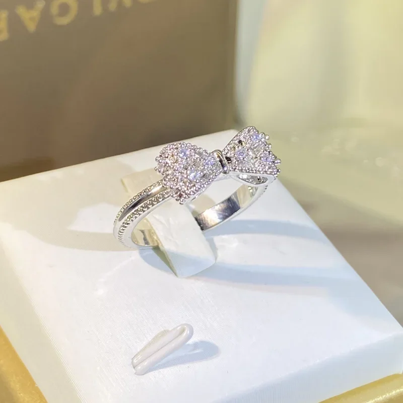 Fancy Bow Ring with Dazzling C - مراجعة Tie Clip Silver وسعره